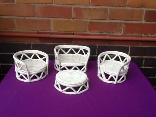 A Young Girls Cane Lounge Suite and Coffey Table.