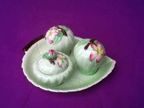 A Carltonware Salt, Pepper and Mustard Set in Green with Stand.