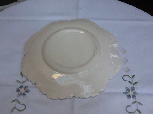 A Porcelain  Plate with a Beryl Cook Transfer.