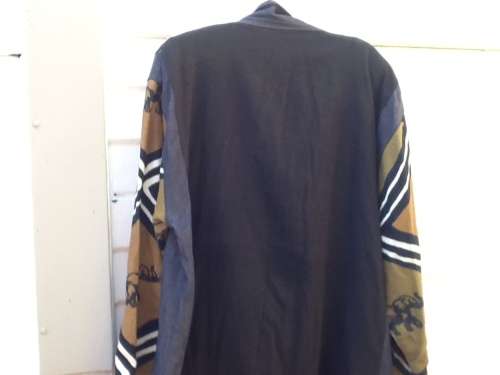 A Large Shirt/Jacket in the African Scene.  Size XL Meetu Magic.