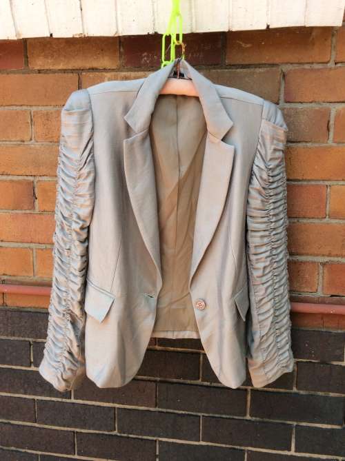 A Pretty Jacket, Colour Light Beige, Label : Pringle, Size 10.