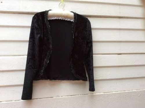 A Pretty Black Bolero Type Jacket. Label :Candy Rocket.