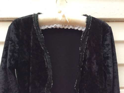 A Pretty Black Bolero Type Jacket. Label :Candy Rocket.