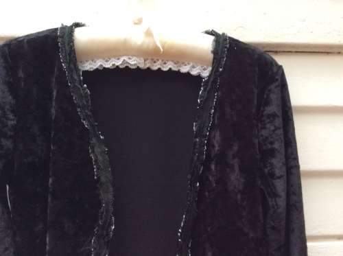 A Pretty Black Bolero Type Jacket. Label :Candy Rocket.