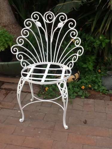 Ornate Wrought Iron Garden Chair.