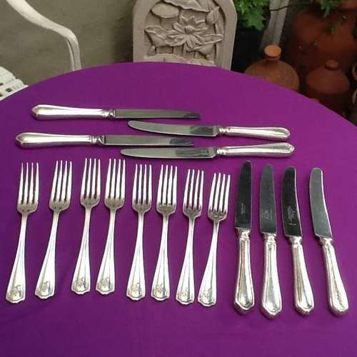 A Set of Sheffield Plate  Cutlery.   8 Knives and 8 Forks.