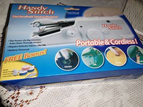 Handheld sewing machine