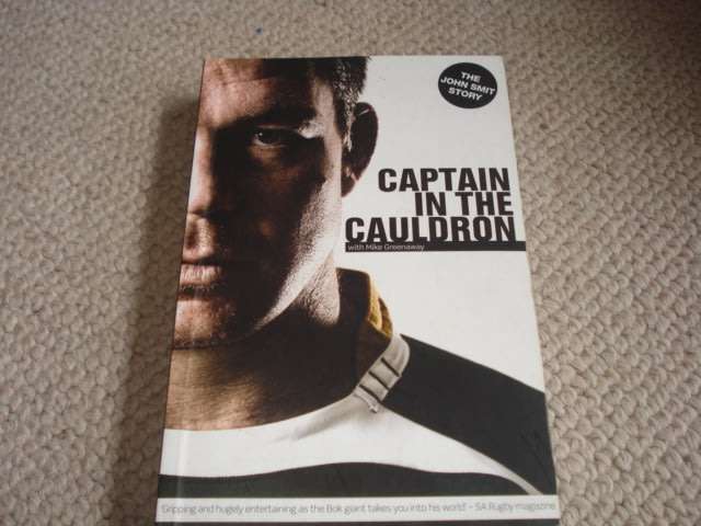 "CAPTAIN IN THE CAULDRON " SIGNED BY JOHN SMIT-SEE BELOW