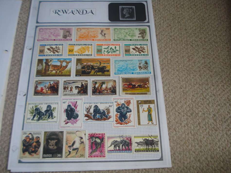 RWANDA-COLLECTION ON 4 ALBUM PAGES-NICE THEMATICS !!