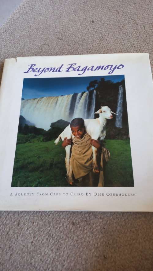 SCARCE COFFEE TABLE BOOK IN SLIP CASE " BEYOND BAGAMOYO " SIGNED COPY !!  READ BELOW