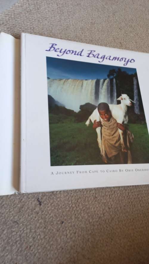 SCARCE COFFEE TABLE BOOK IN SLIP CASE " BEYOND BAGAMOYO " SIGNED COPY !!  READ BELOW