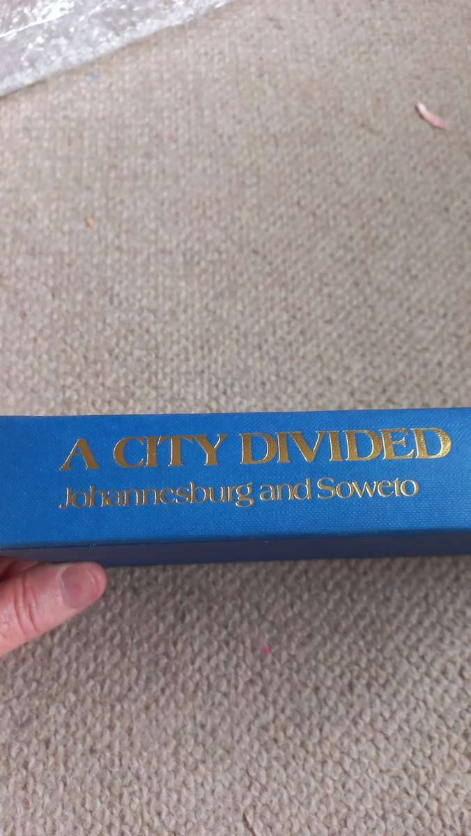 A CITY DIVIDED-JOHANNESBURG AND SOWETO-SIGNED BY NIGEL MANDY