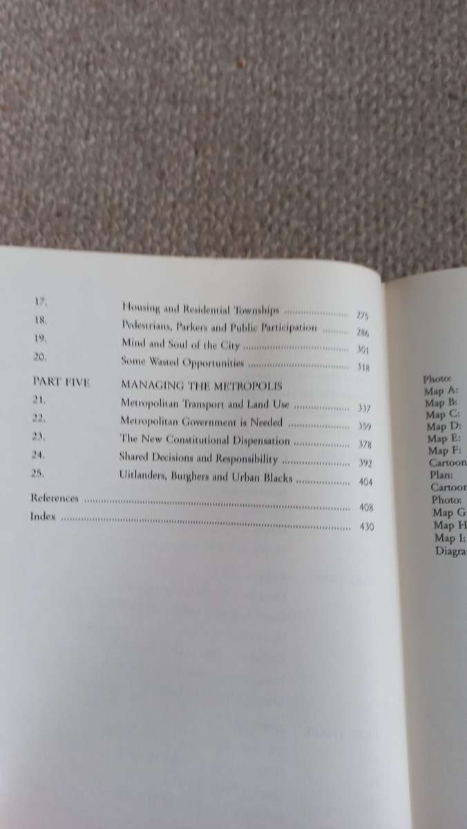 A CITY DIVIDED-JOHANNESBURG AND SOWETO-SIGNED BY NIGEL MANDY