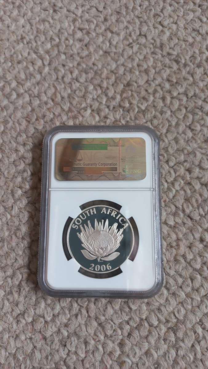 A SCARCE " PF70 ULTRA CAMEO " OF THE LATE SIR DESMOND TUTU  SILVER NOBEL LAUREATE