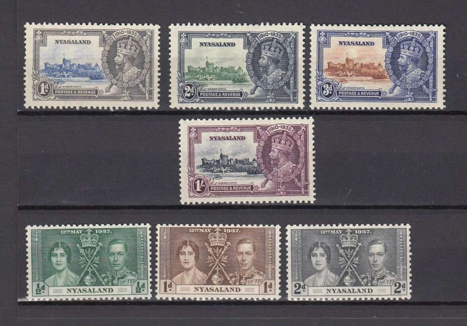 NYASALAND-SILVER JUBILEE SET AND CORONATION LIGHT HINGE REM.   40 POUNDS