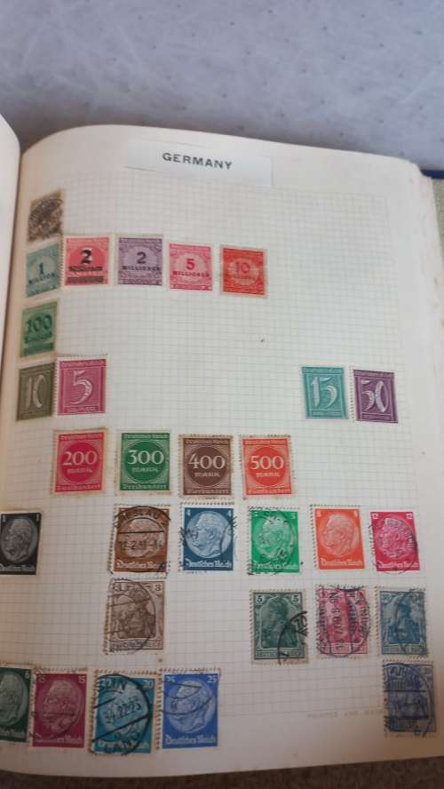 ALBUM WITH MANY COUNTRIES SOME NICE CHINA USA AND MORE-SOME CONDITION ISSUES