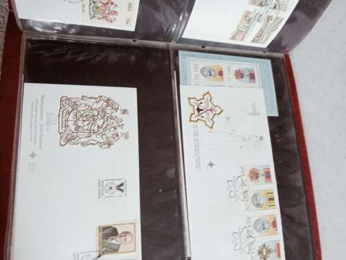 TWO FDC ALBUMS WITH QUALITY PLASTIC POCKETS MANY MANY FDC RSA AND BOP.