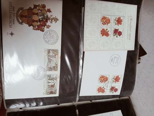TWO FDC ALBUMS WITH QUALITY PLASTIC POCKETS MANY MANY FDC RSA AND BOP.