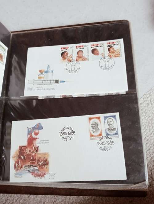 TWO FDC ALBUMS WITH QUALITY PLASTIC POCKETS MANY MANY FDC RSA AND BOP.