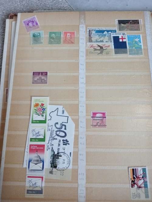 USA AND CANADA IN STOCK BOOK-A LITTLE MESSY AND SOME STUCK