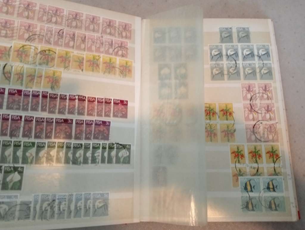 STOCK BOOK-RSA  FULL OF USED BLOCKS, SINGLES.DUES AND OTHERS-FINDS NO DOUBT !! NOT NEARLY ALL SHOWN