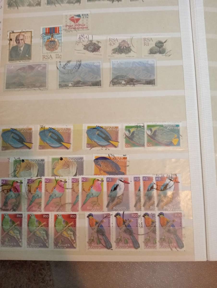 STOCK BOOK-RSA  FULL OF USED BLOCKS, SINGLES.DUES AND OTHERS-FINDS NO DOUBT !! NOT NEARLY ALL SHOWN