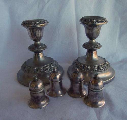SILVER PLATED CANDLE STICKS AND SALT AND PEPPER POTS