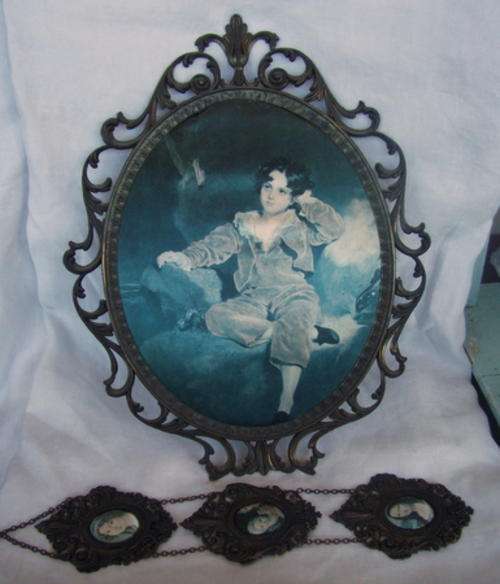 A EXTRA LARGE ITALIAN FRAME AND A STRING WITH THREE LITTLE ONES