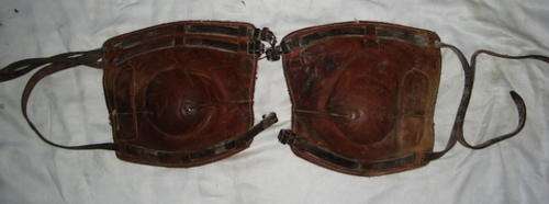 TWO VINTAGE LEATHER KNEE GUARDS