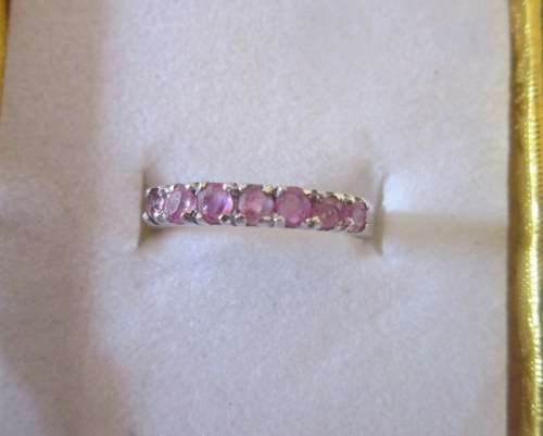 Beautiful natural rubies set in sterling silver ring. Size P