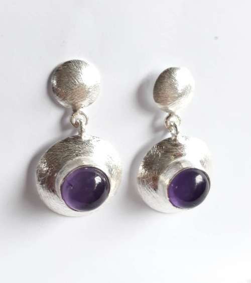 Lovely Amethysts in sterling silver earrings.