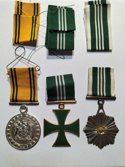 Large/Full Correctional Service Medals with extra ribbons and a metalbar