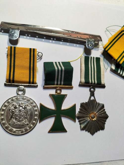 Large/Full Correctional Service Medals with extra ribbons and a metalbar