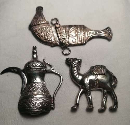 Sterling silver camel, jug and gun