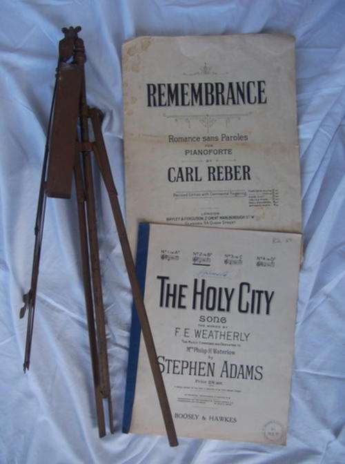 VINTAGE PORTABLE MUSIC STAND WITH TWO PIECES OF SHEET MUSIC