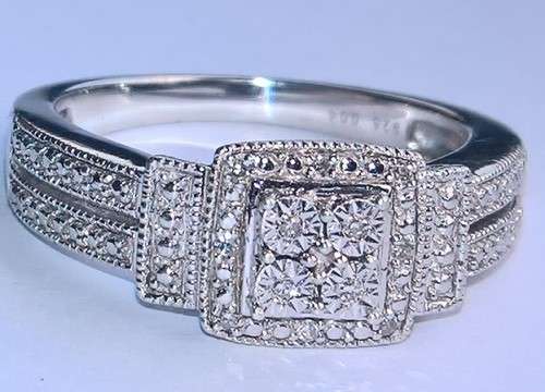 Sterling silver ladies ring with diamonds