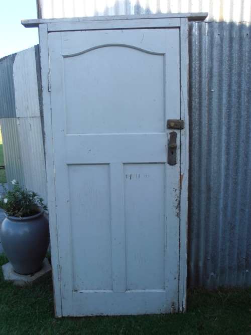Very solid vintage wooden door in frame with Viro lock