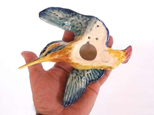 Three graduated porcelain Beswick kingfishers, wall plaques