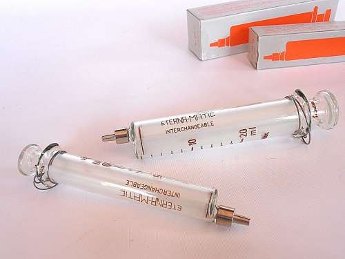 Two Swiss Sanitex Eterna-Matic glass syringes, new in original boxes, 10 ml & 20 ml, Switzerland
