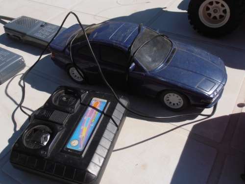 Lot radio controlled cars, Ferrari, monster trucks etc, played with condition, for parts, sold as is