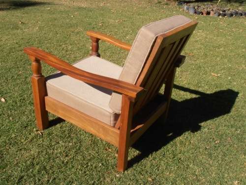 A stylish solid Morris chair with cushions, (one of three available)