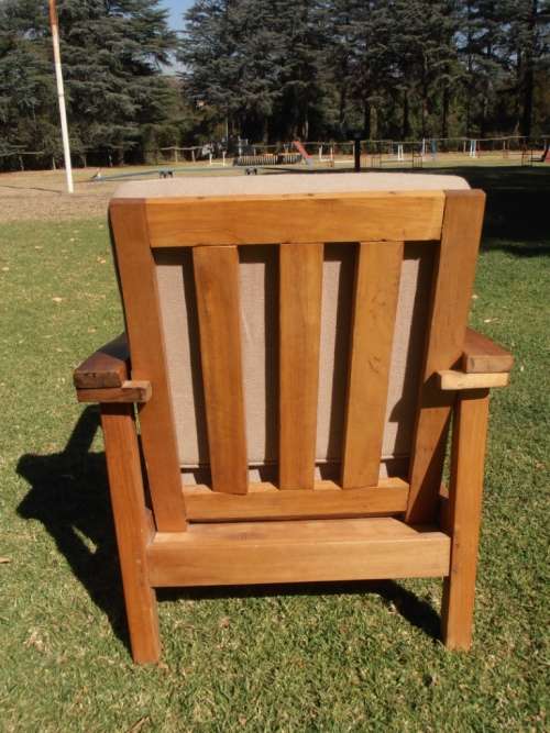 A stylish solid Morris chair with cushions, (one of three available)