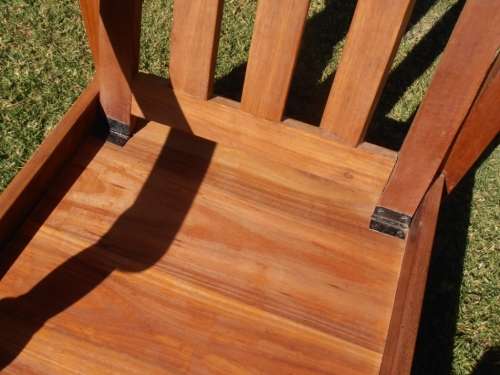 A stylish solid Morris chair with cushions, (one of three available)