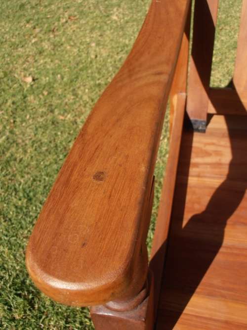 A stylish solid Morris chair with cushions, (one of three available)