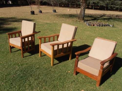 A stylish solid Morris chair with cushions, (one of three available)