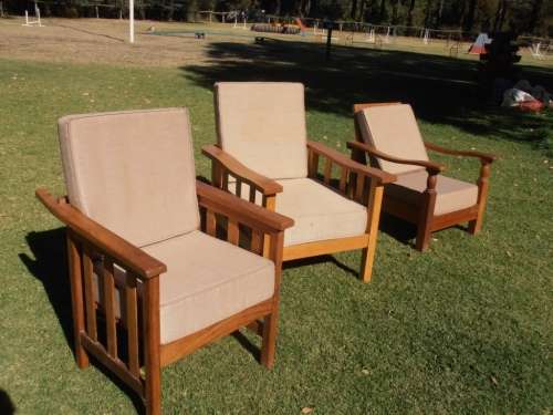 A stylish solid Morris chair with cushions, (one of three available)