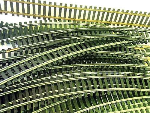 Vintage Lima tracks, 12 straight, 14 curves (12+2), 3 slip points, HO scale