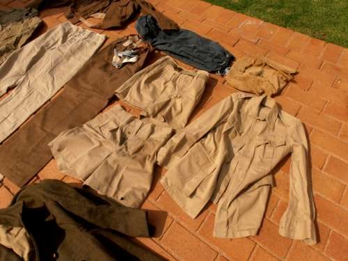 Large lot military clothing, WW2 to 1960's, battle dress, coat, balsak, bag, beige shorts & tops etc