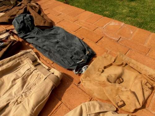 Large lot military clothing, WW2 to 1960's, battle dress, coat, balsak, bag, beige shorts & tops etc