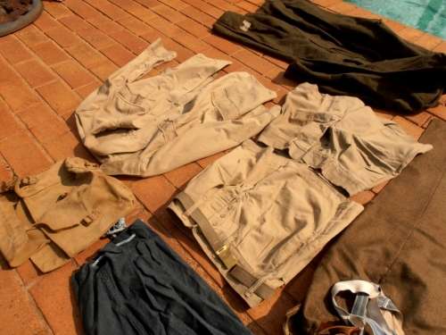Large lot military clothing, WW2 to 1960's, battle dress, coat, balsak, bag, beige shorts & tops etc